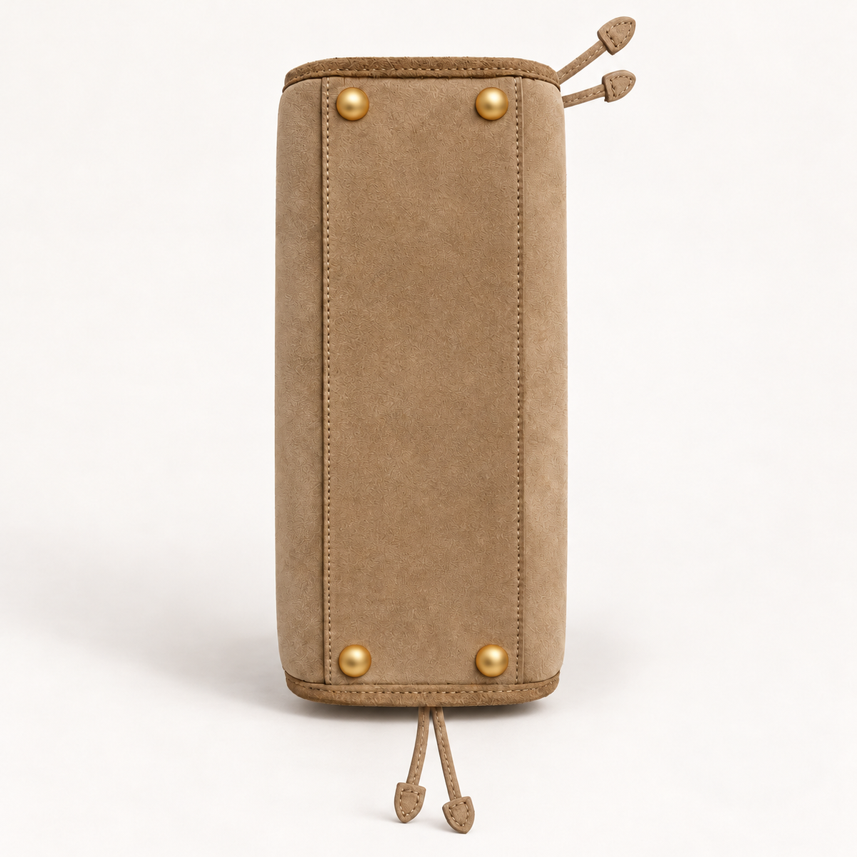RANI Amara Oat nubuck suede bag, bottom view showing four gold protective feet